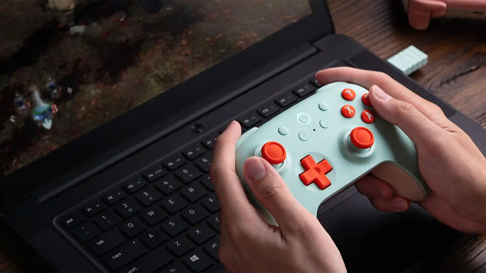 8BitDo Ultimate 2C controller in use with a laptop