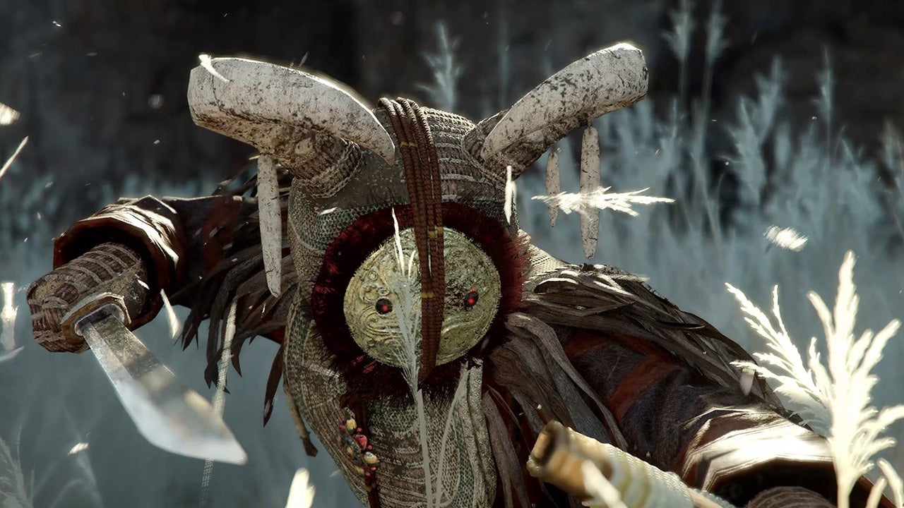 Crimson Desert Reed Devil boss close-up showing masked enemy with horns in a reed field
